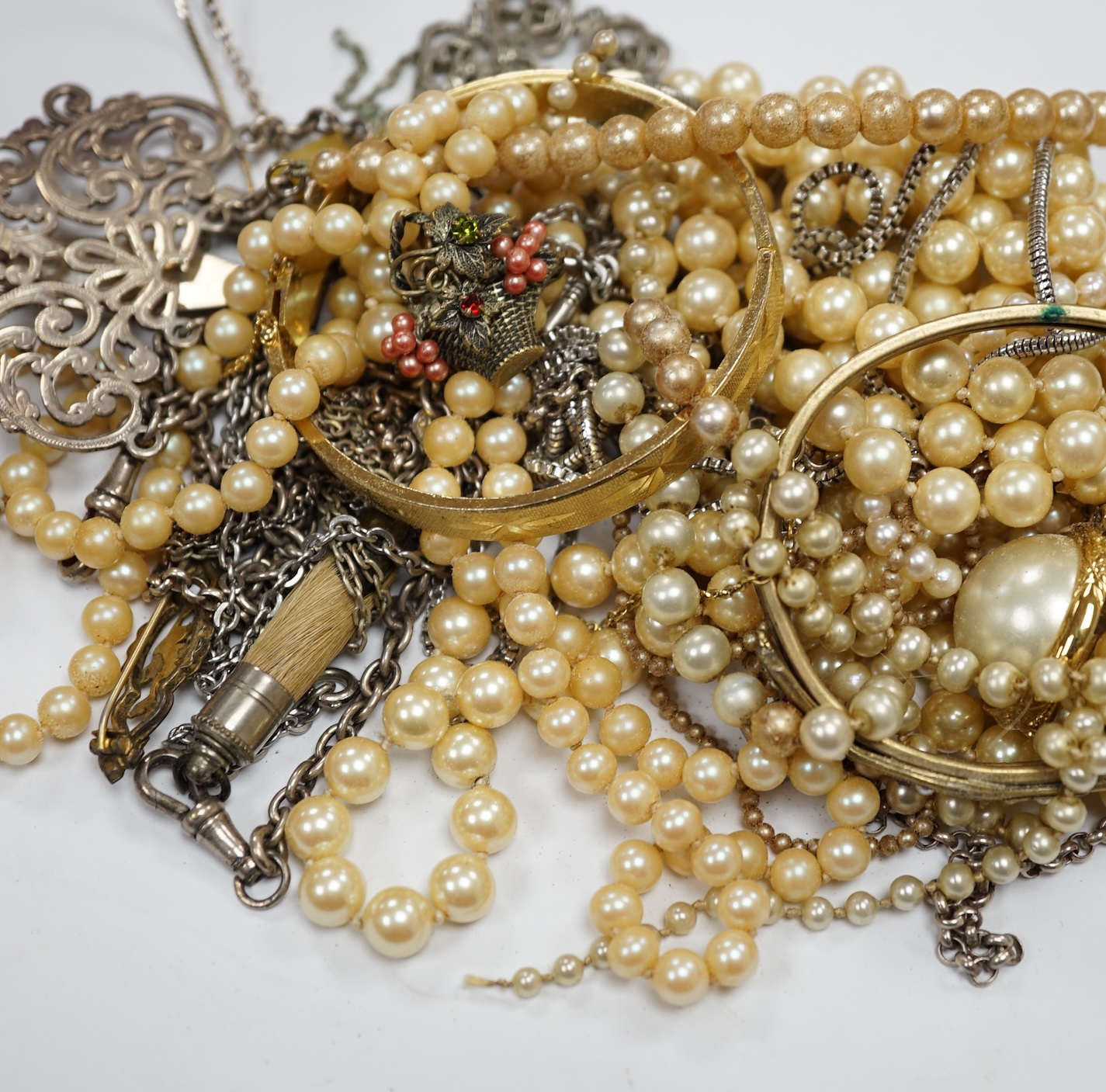 A quantity of assorted silver, white metal and costume jewellery, including bangles, fruit knife, etc. Condition - poor to fair